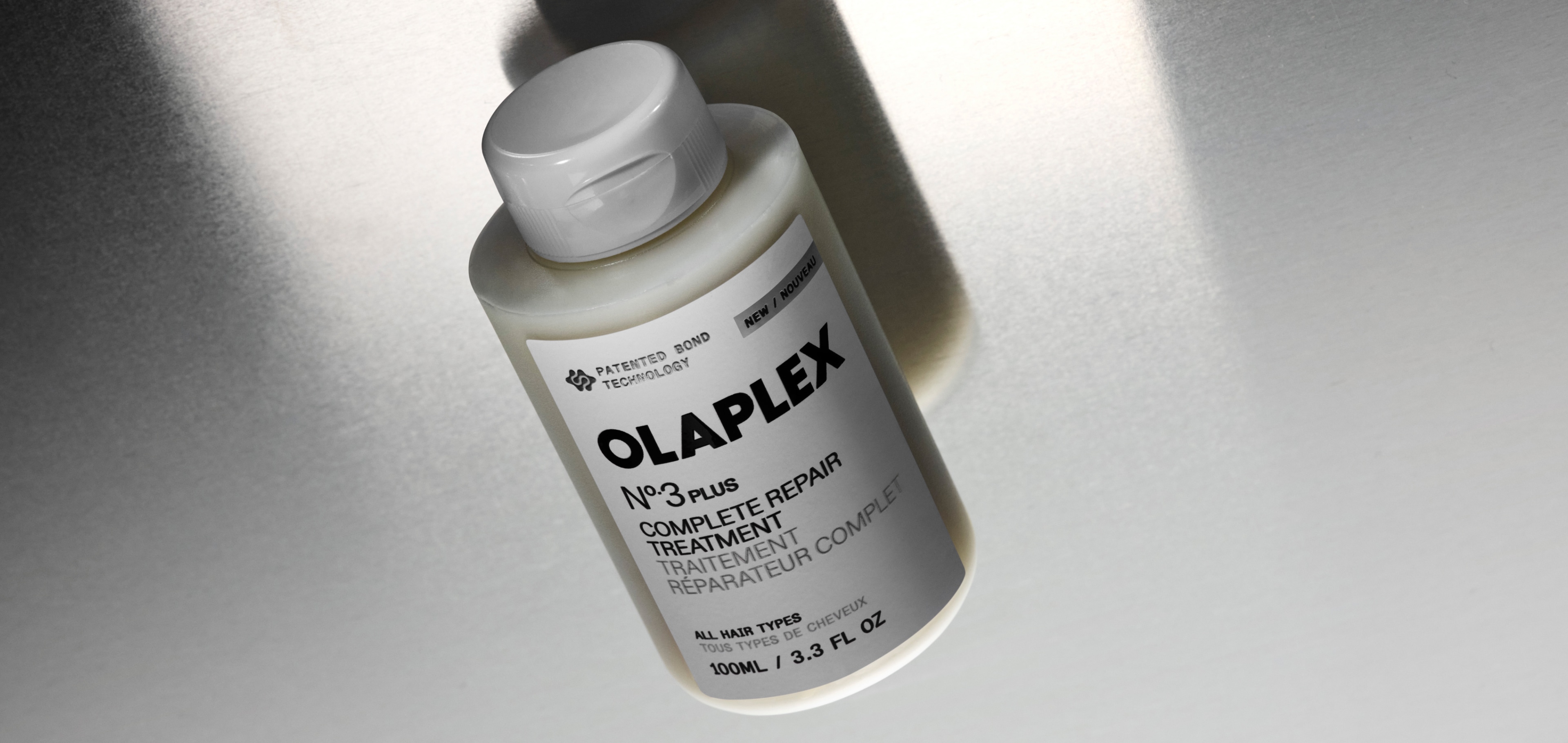 צילום קמפיין מקורי של OLAPLEX — No.3 PLUS · Complete Repair Treatment